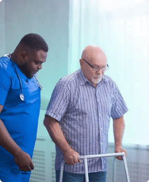 nurse assisting old man using walker